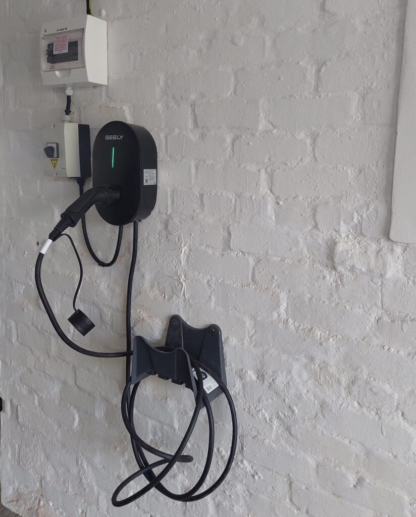 Set up for two 7kW chargers using a manual change-over switch to select charger 1 or charger 2 (32 amps)